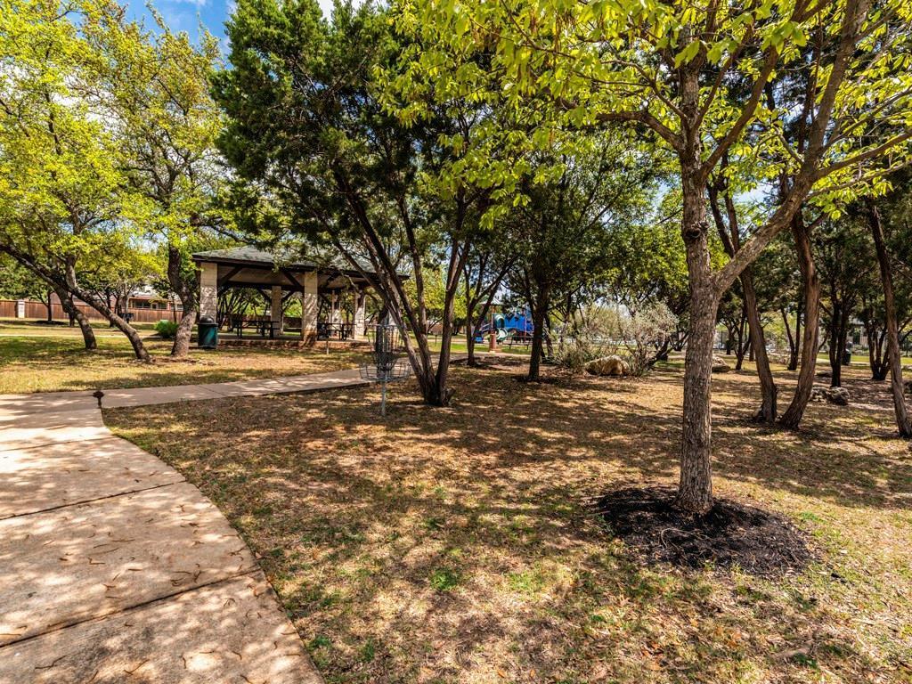 6 Verde Ranch Loop Leander, TX 78641 - Photo 23 of 24 a view of road with trees