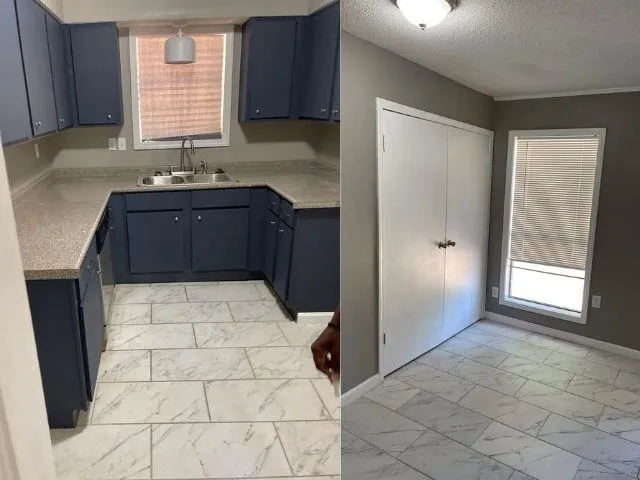 a kitchen with a sink a stove and refrigerator