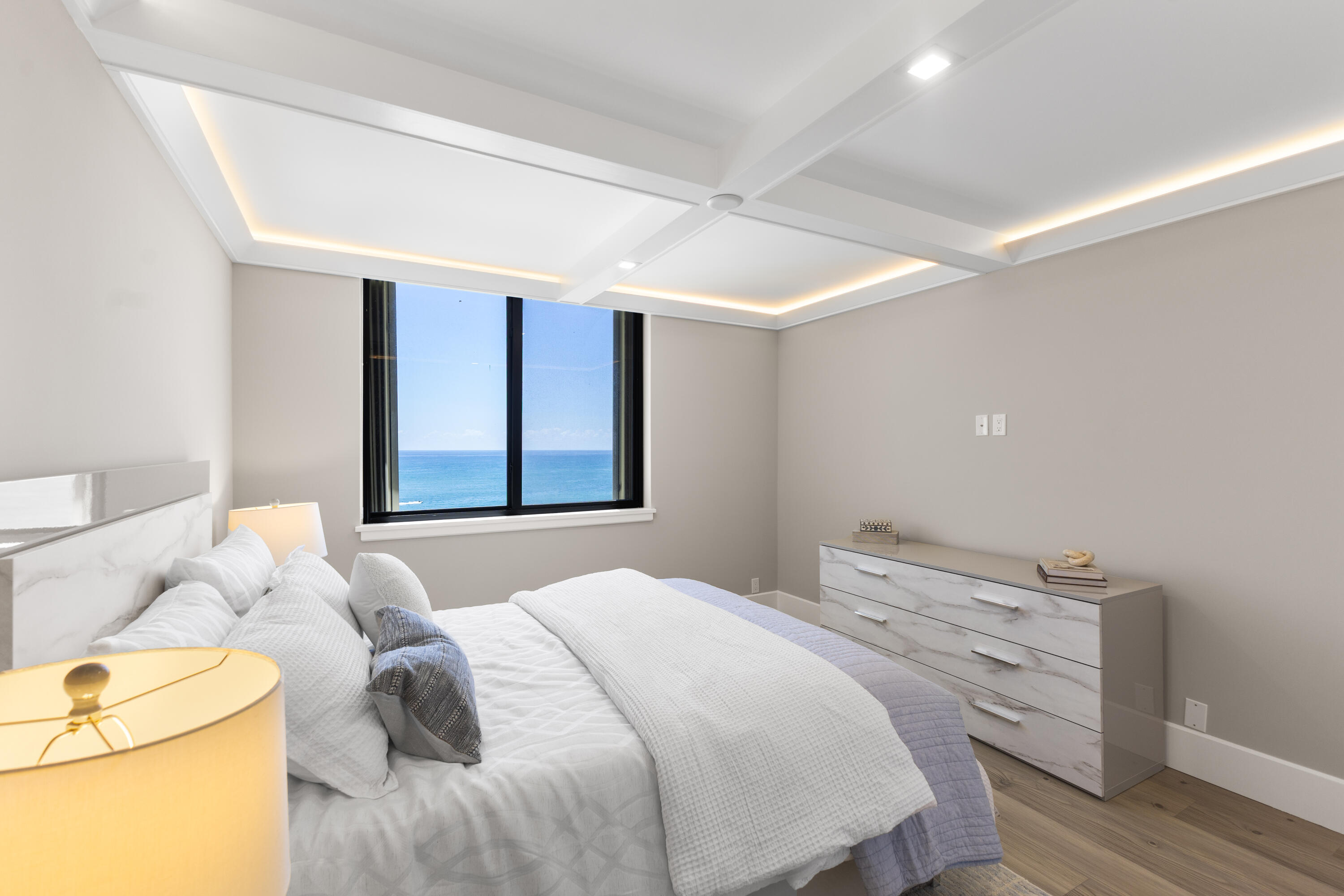 400 Ocean Trail Way, Unit 1008 Jupiter, FL 33477 - Photo 14 of 32 a bedroom with a bed and a window