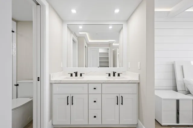 a bathroom with a shower and a toilet