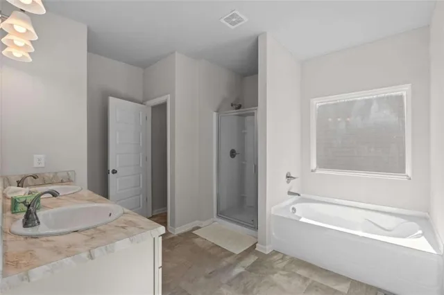 $329,900 | 9068 Jim Purcell Drive, Covington, GA 30014