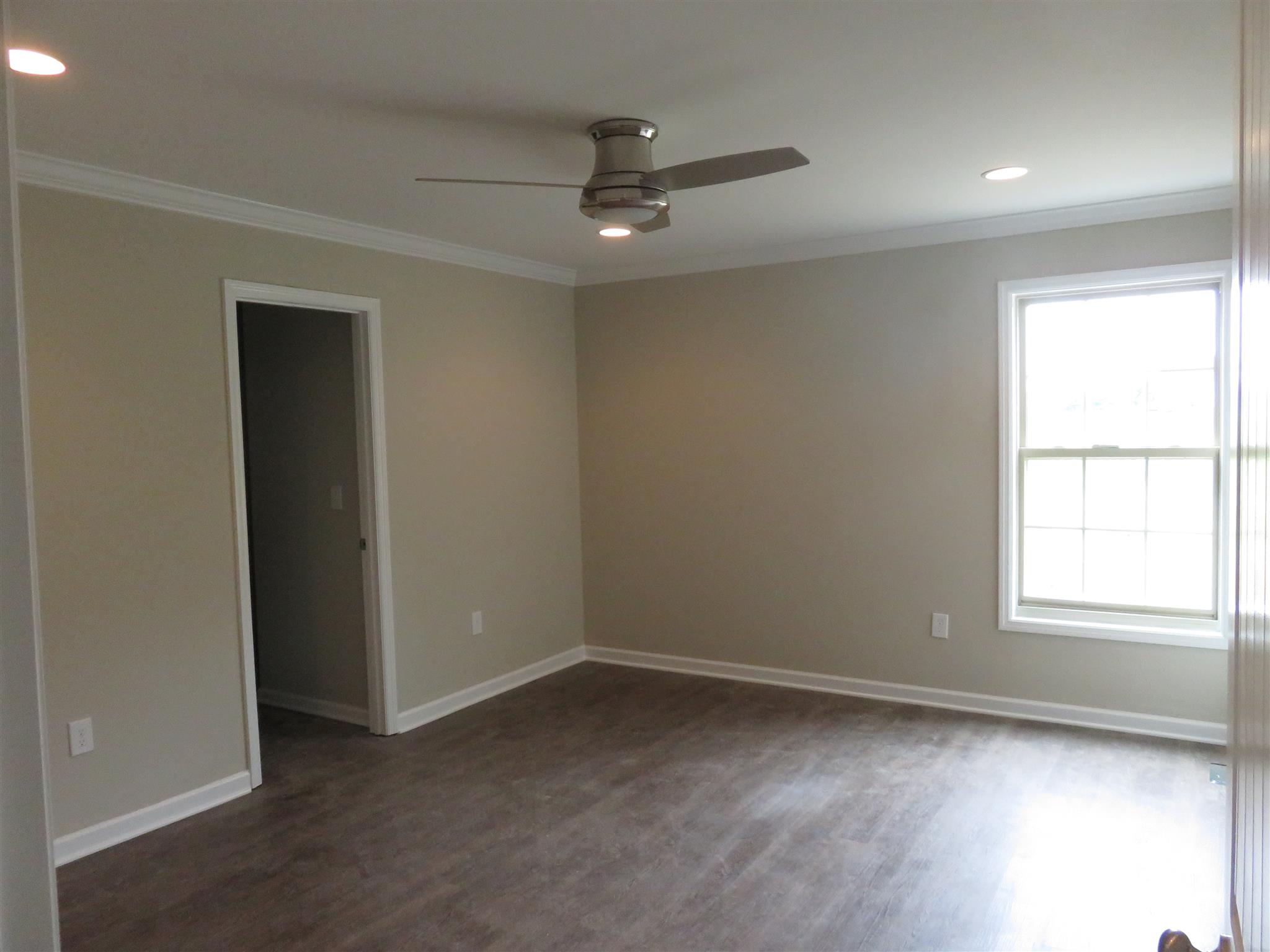 51 Shipley Road Manchester, TN 37355 - Photo 5 of 13 Master Bedroom with upgrades flooring. No carpet in this home.