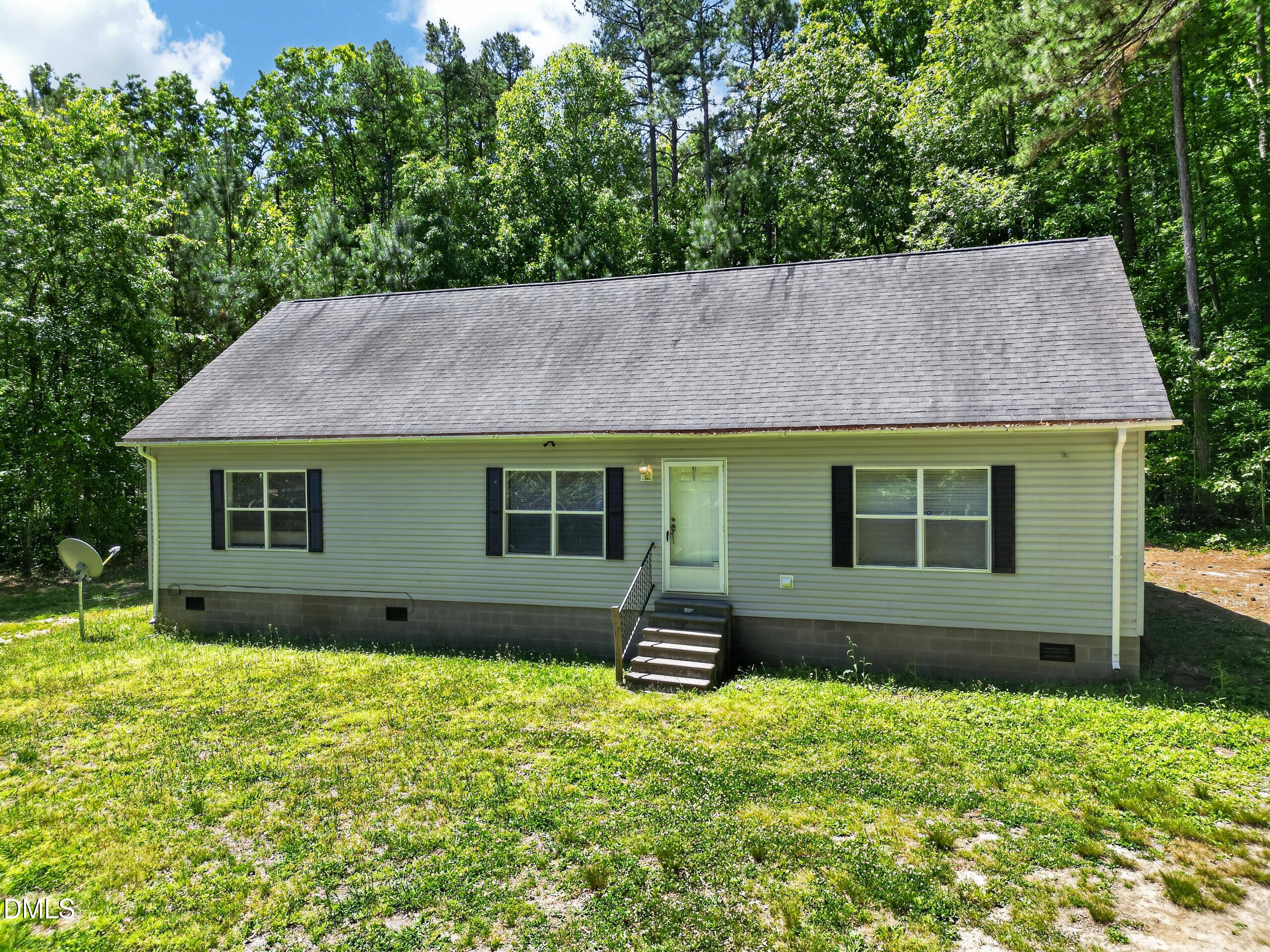 126 Hunter Road Henderson, NC 27537 - Photo 3 of 5 a view of house with backyard