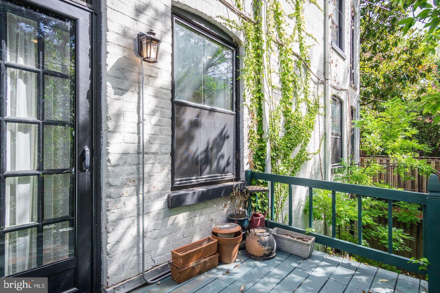 3040 R Street Northwest, Unit 1/2 Washington, DC 20007 - Photo 13 of 33 a view of a balcony with furniture