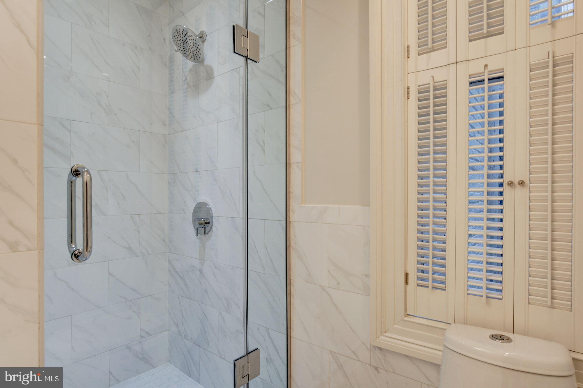 3040 R Street Northwest, Unit 1/2 Washington, DC 20007 - Photo 22 of 33 a bathroom with a shower