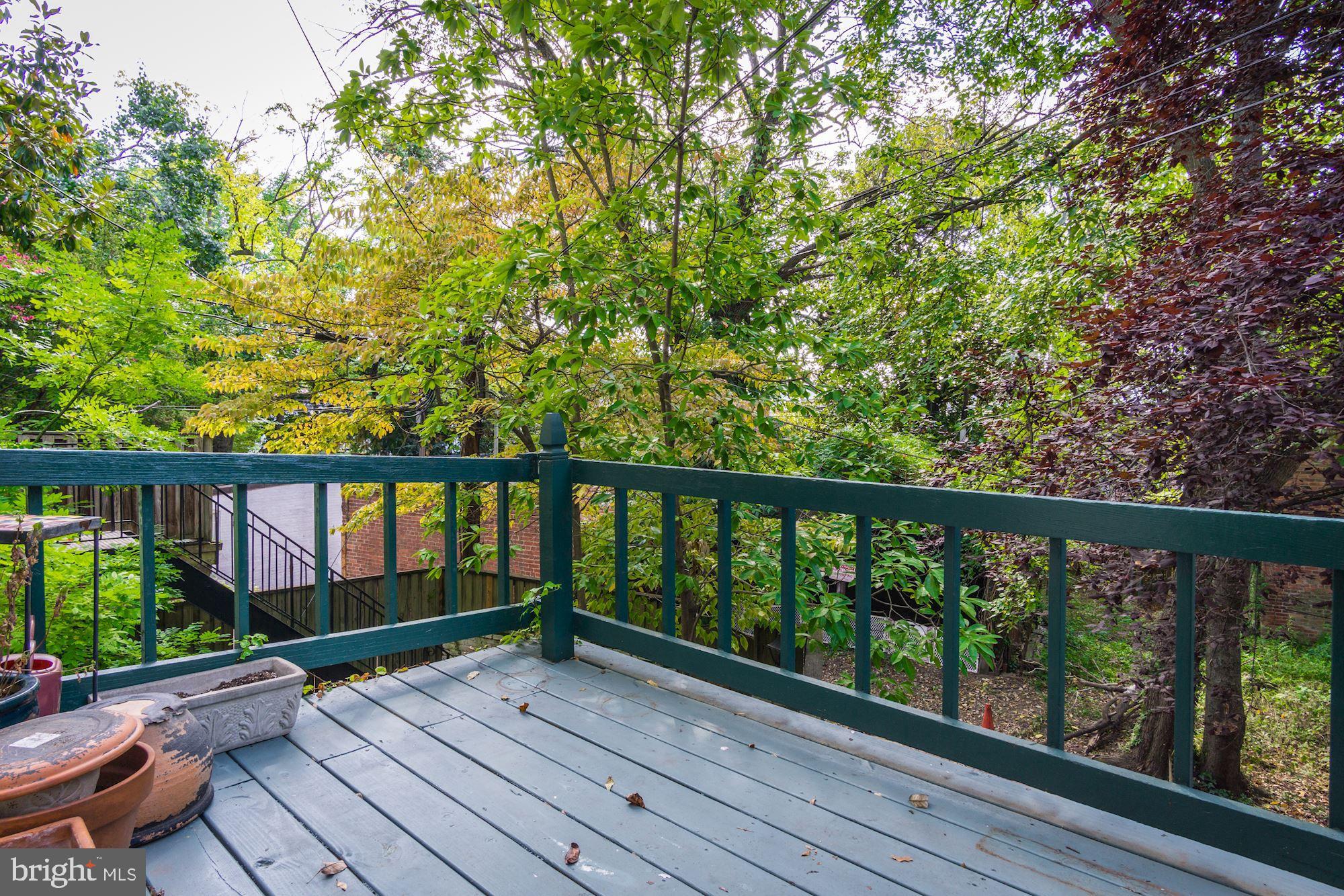 3040 R Street Northwest, Unit 1/2 Washington, DC 20007 - Photo 27 of 33 a view of balcony with wooden floor