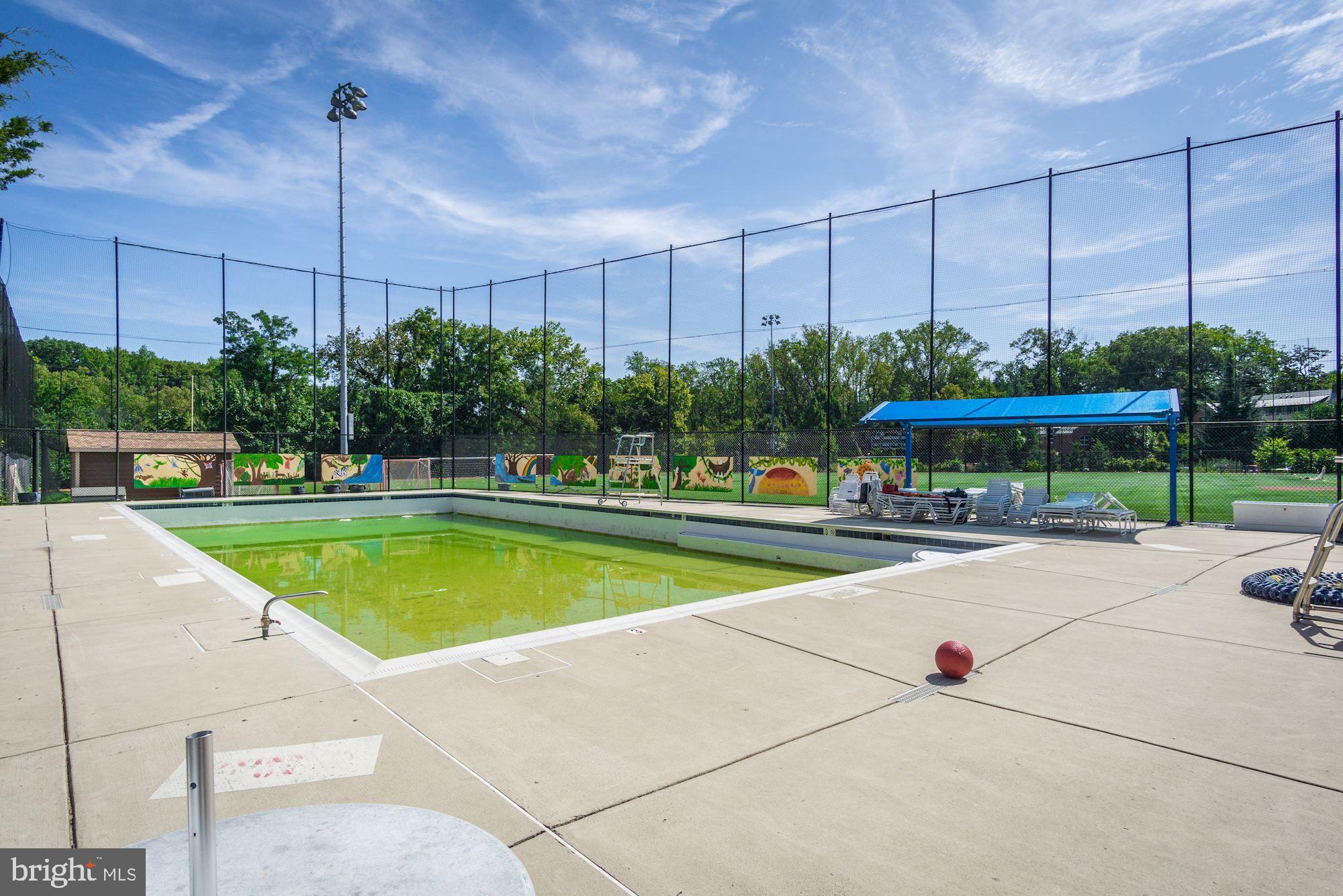 3040 R Street Northwest, Unit 1/2 Washington, DC 20007 - Photo 33 of 33 a view of a swimming pool with a patio