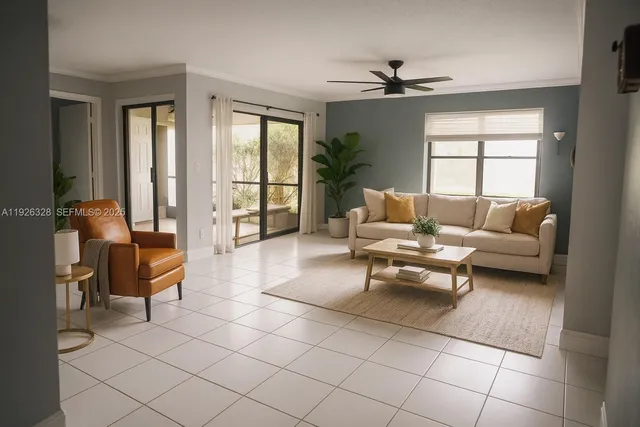 a living room with furniture and a window