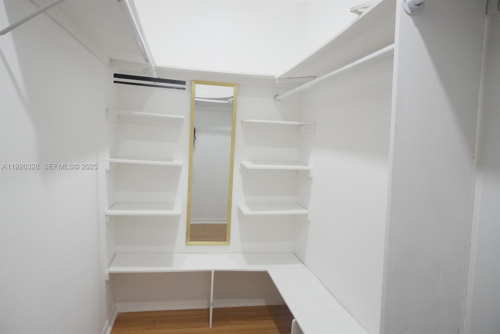 3350 Northwest 47th Avenue, Unit 3273 Coconut Creek, FL 33063 - Photo 7 of 11 a view of an empty walk in closet