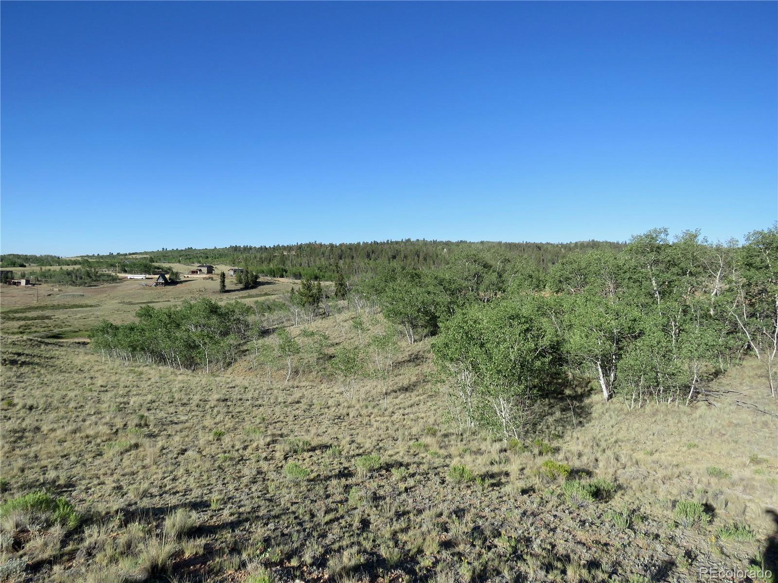 104 Hawk Way Como, CO 80432 - Photo 12 of 19 a view of a field with an outdoor space