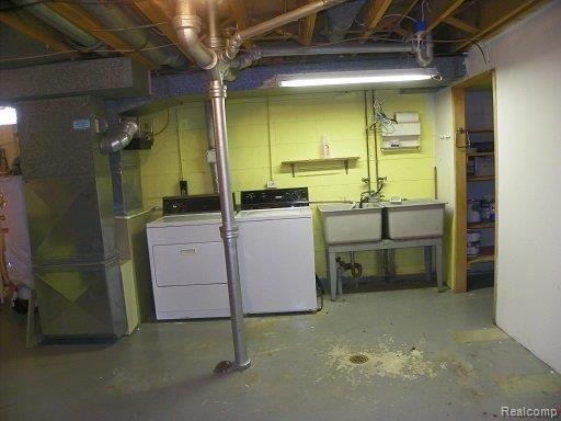 8147 Potomac Street Center Line, MI 48015 - Photo 15 of 31 Bsmt Laundry.jpg