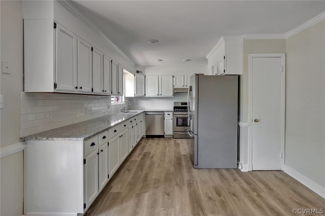 1320 Elon Road Henrico, VA 23229 - Photo 6 of 30 Kitchen with granite countertops, tile backsplash