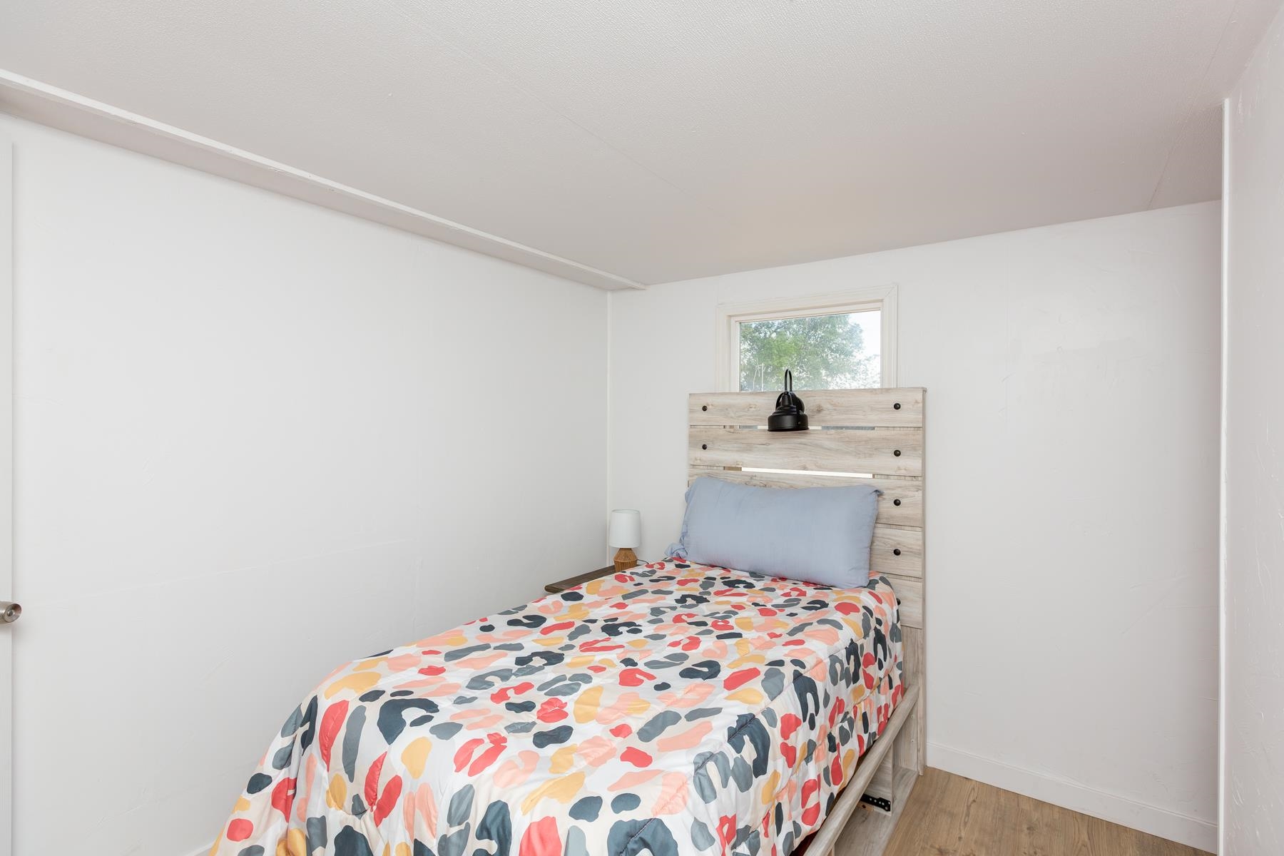 424 32 Road, Unit 112 Clifton, CO 81520 - Photo 17 of 41 a bedroom with a bed and a window