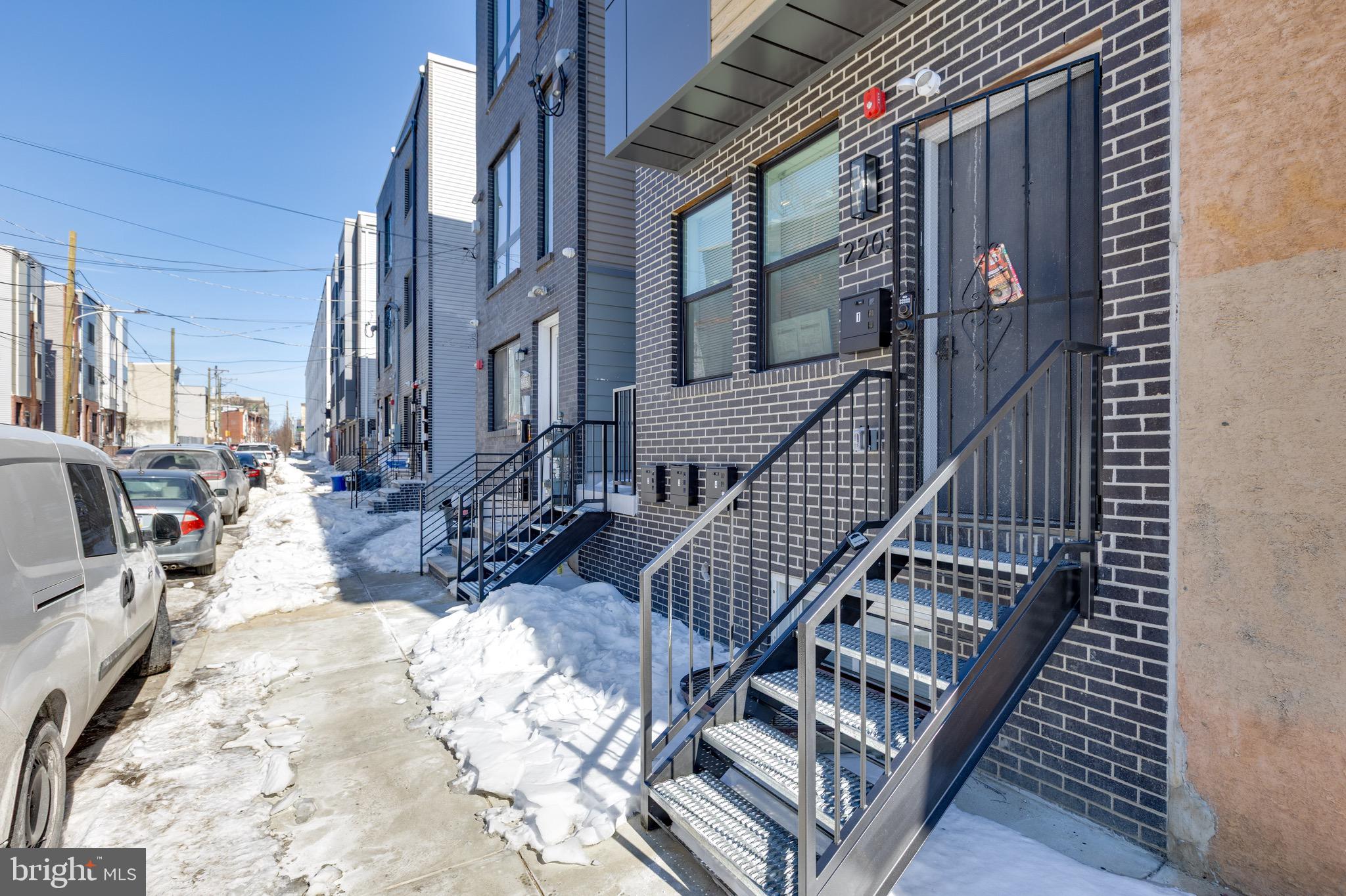 2203 North 7th Street, Unit 2 Philadelphia, PA 19133 - Photo 10 of 12 a view of living room kitchen and entryway