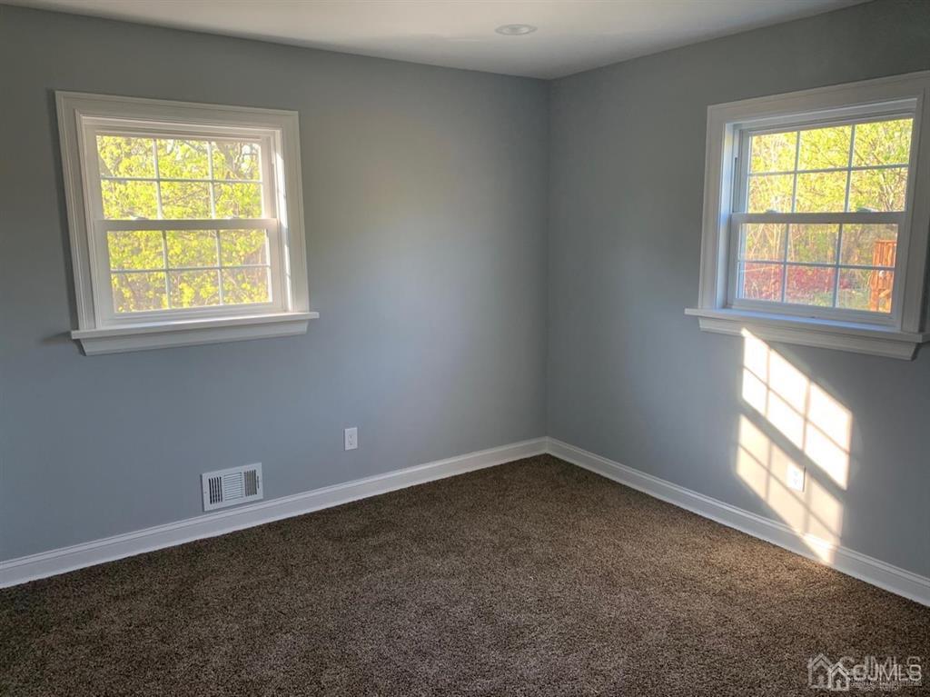 179 Phillips Road Somerset, NJ 08873 - Photo 12 of 26 an empty room with a window