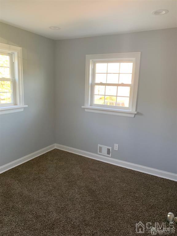 179 Phillips Road Somerset, NJ 08873 - Photo 14 of 26 an empty room with a window