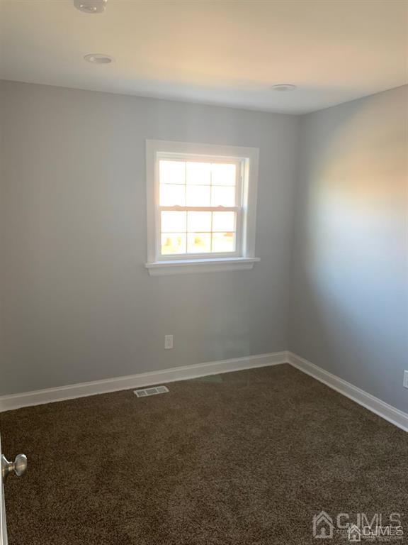 179 Phillips Road Somerset, NJ 08873 - Photo 15 of 26 an empty room with a window