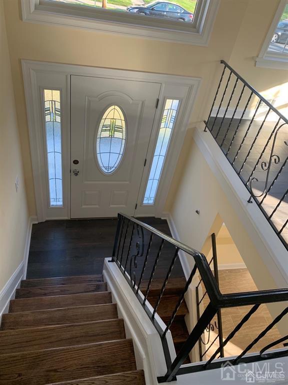 179 Phillips Road Somerset, NJ 08873 - Photo 17 of 26 a view of entryway with wooden floor