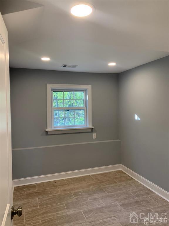 179 Phillips Road Somerset, NJ 08873 - Photo 24 of 26 a view of an empty room with a window
