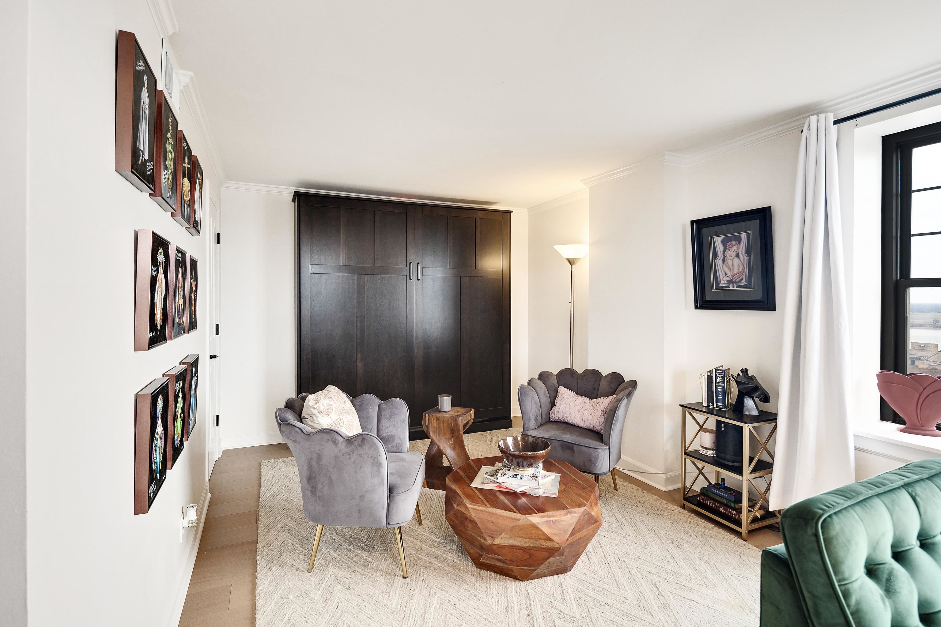 109 North Main Street, Unit 1610 Memphis, TN 38103 - Photo 35 of 35 a living room with furniture and a flat screen tv