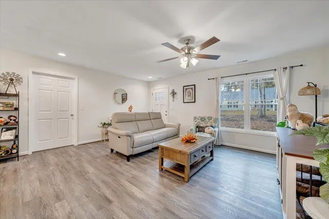 a front view of house with yard outdoor seating and barbeque oven