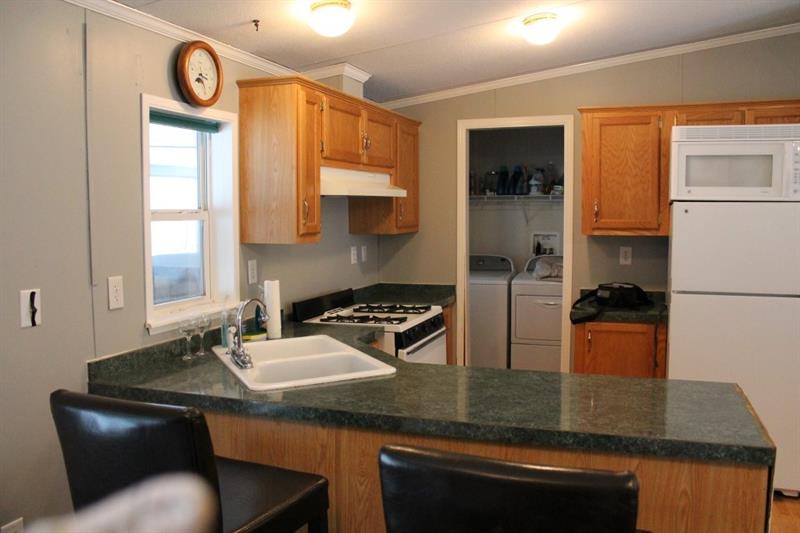 461 Jefferson School Road Ligonier, PA 15658 - Photo 20 of 25 Great kitchen with everything you need plus a laundry room beyond!