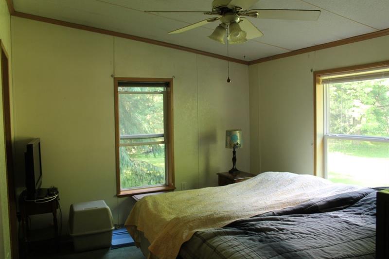 461 Jefferson School Road Ligonier, PA 15658 - Photo 21 of 25 Sunny and open master bedroom.
