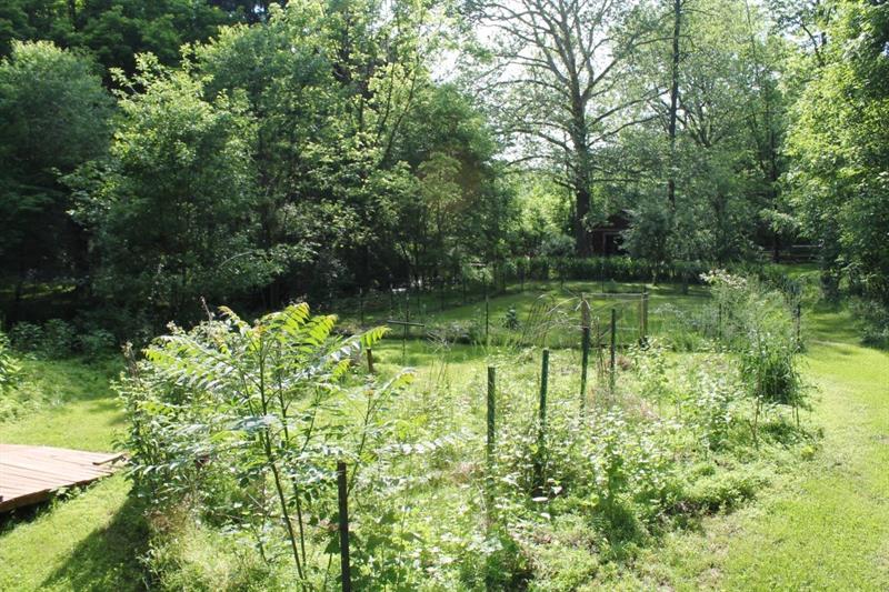 461 Jefferson School Road Ligonier, PA 15658 - Photo 10 of 25 Entering the garden area where the organic fenced garden begins.