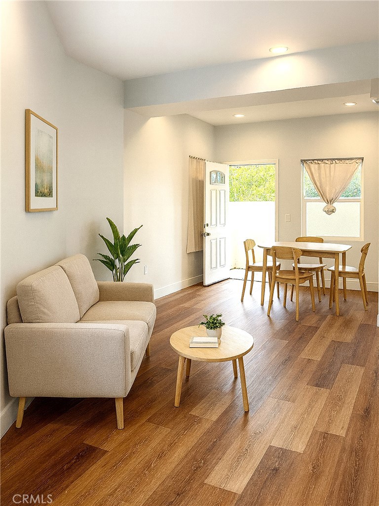 300 East Alhambra Road, Unit F Alhambra, CA 91801 - Photo 2 of 20 a living room with furniture and wooden floor