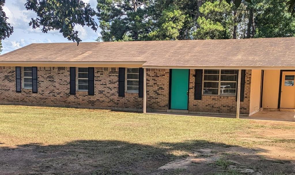 a house view with a outdoor space