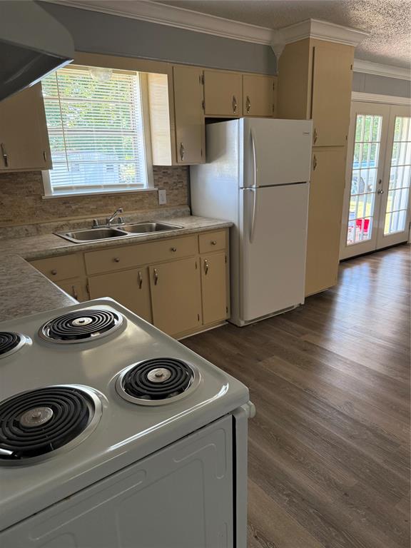 294 FISHING GROUNDS Road Pelican, LA 71063 - Photo 11 of 22 a kitchen with a stove and a refrigerator