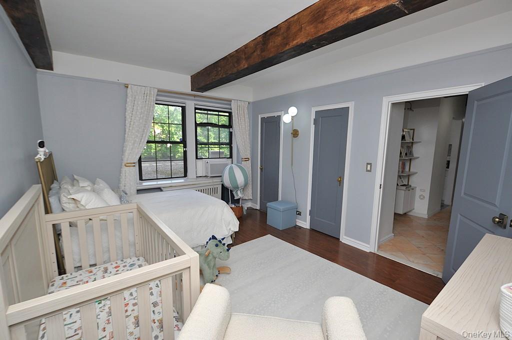 192 Garth Road, Unit TP Scarsdale, NY 10583 - Photo 27 of 43 The private bedroom wing features two spacious bedrooms and two beautifully updated bathrooms, creating a peaceful retreat from the day. Every detail has been carefully curated to deliver comfort, style, and functionality.