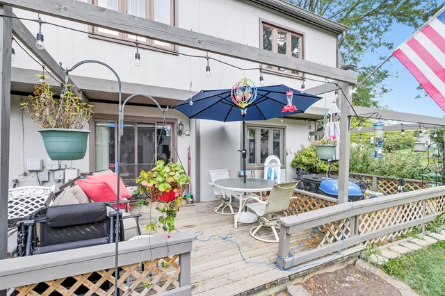 a picture of a bench in front of a wall