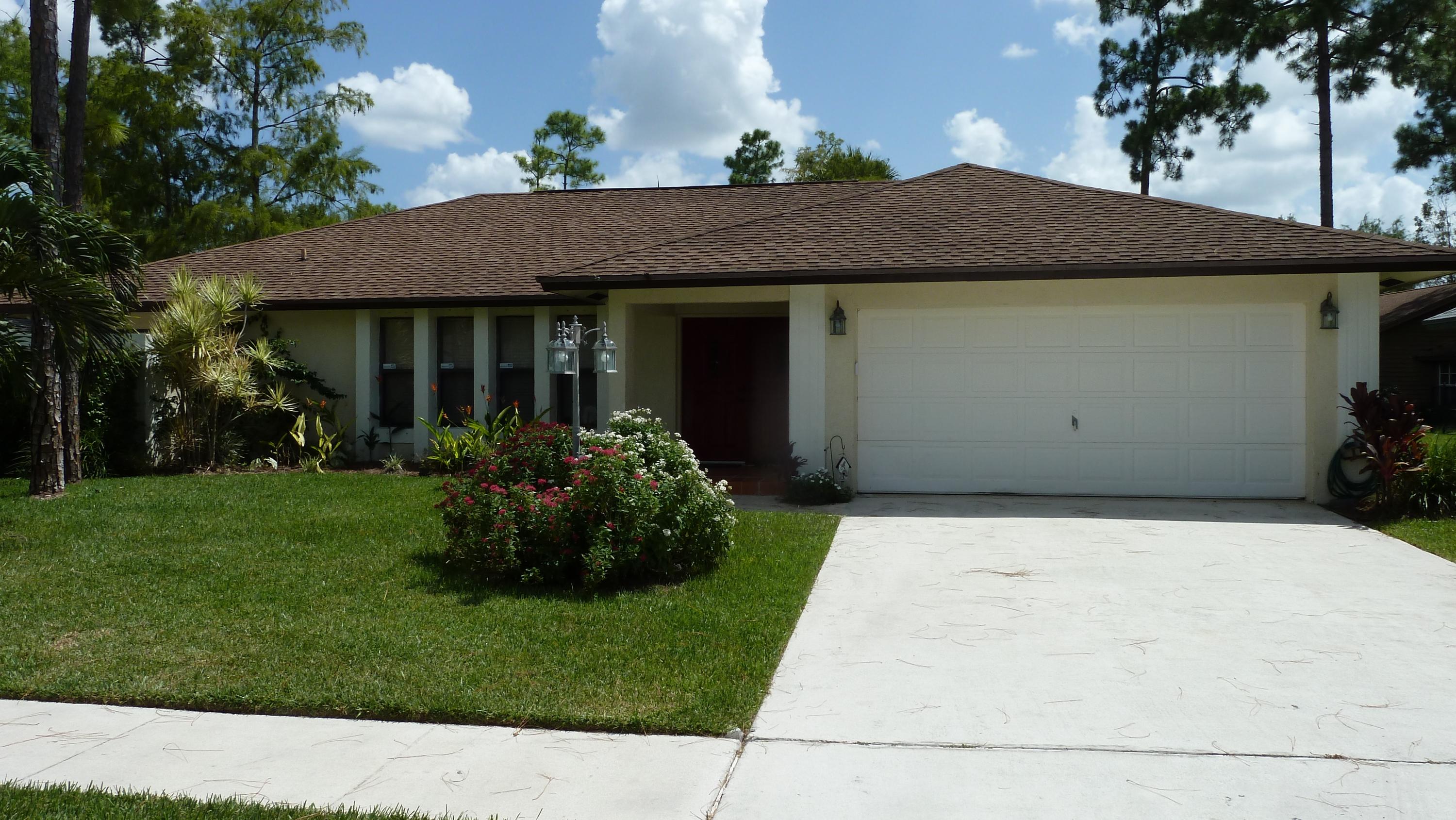 1075 Raintree Lane Wellington, FL 33414 - Photo 1 of 21 Exterior