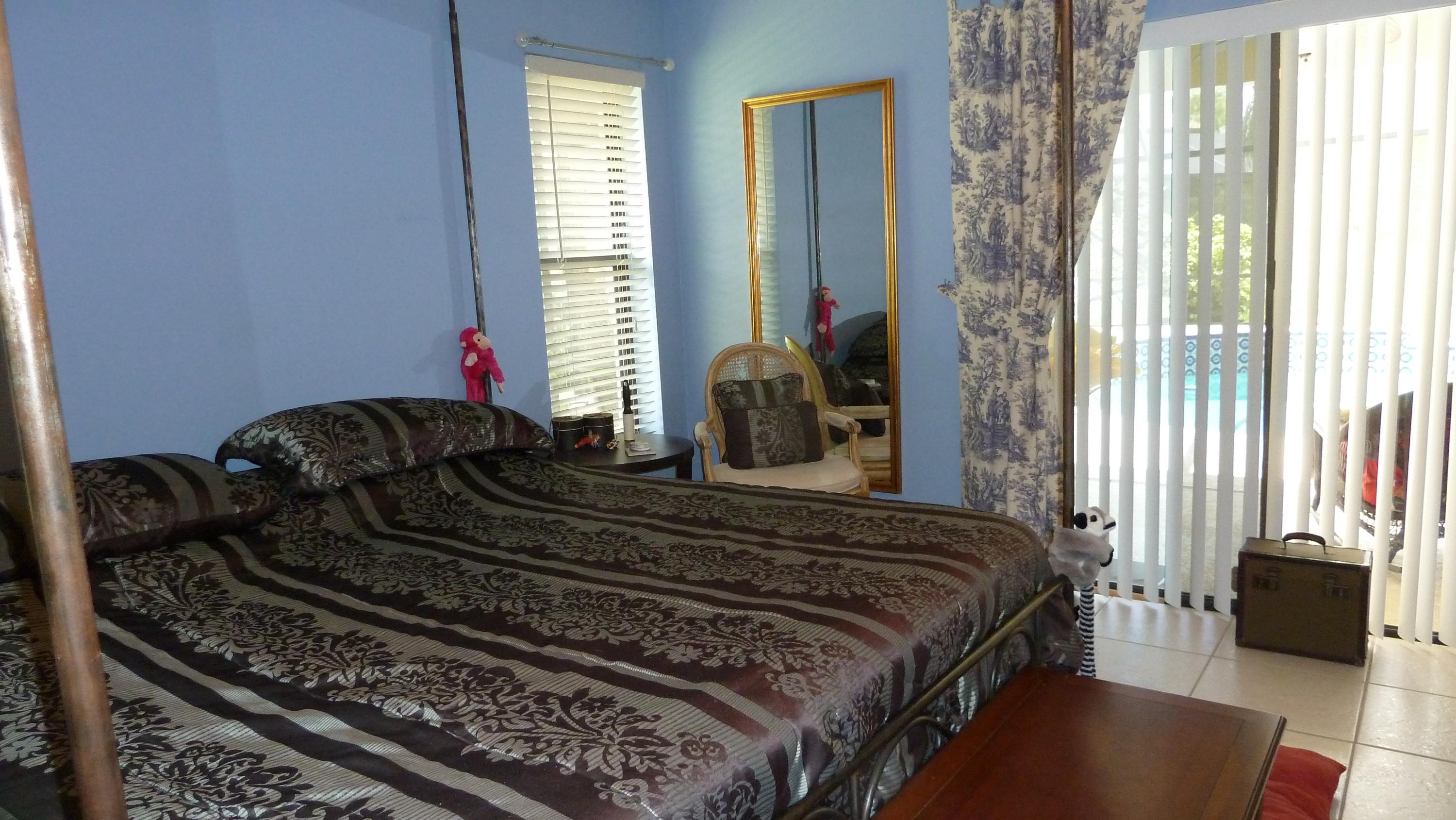 1075 Raintree Lane Wellington, FL 33414 - Photo 11 of 21 Master Bedroom