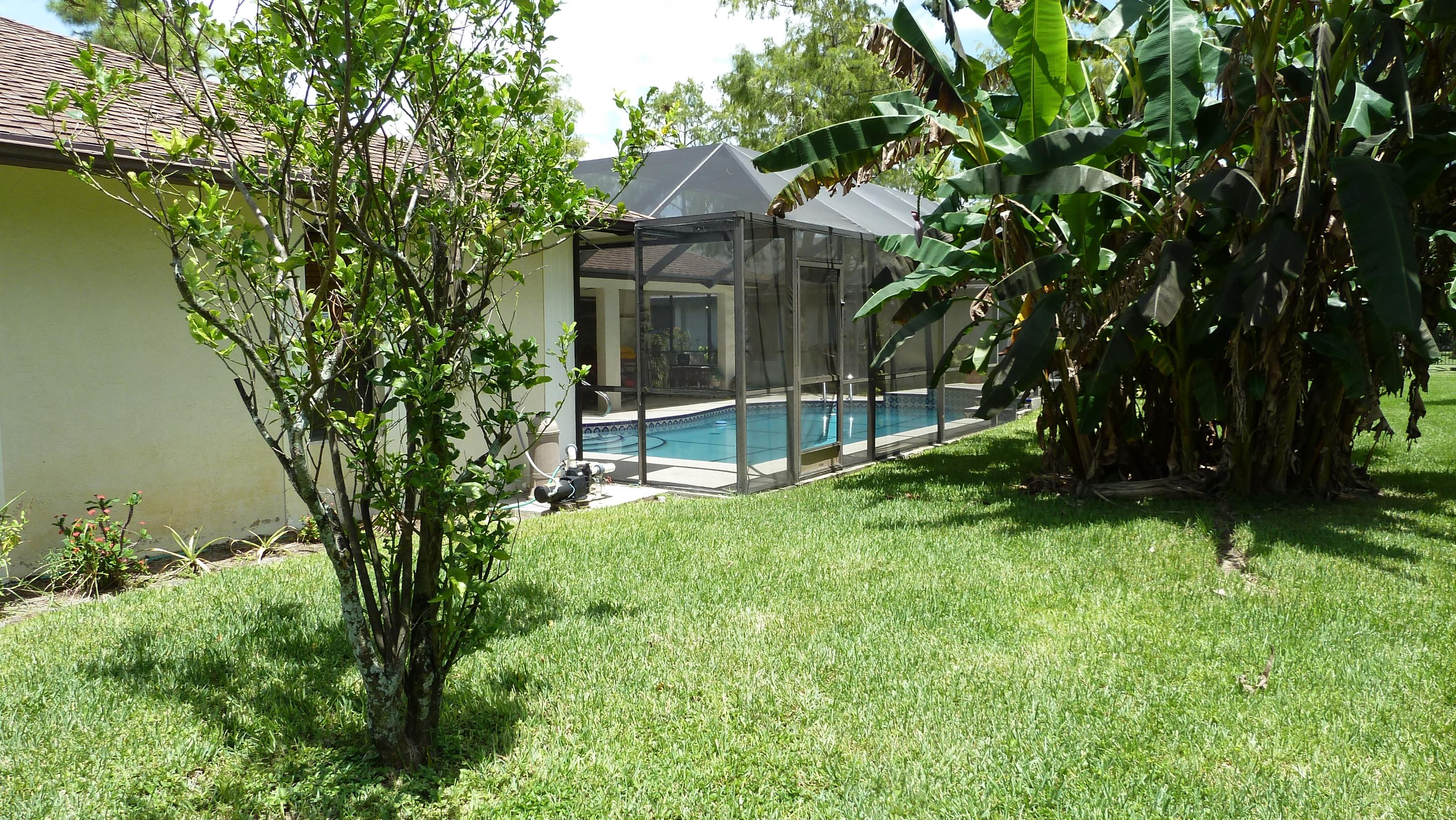 1075 Raintree Lane Wellington, FL 33414 - Photo 20 of 21 Backyard