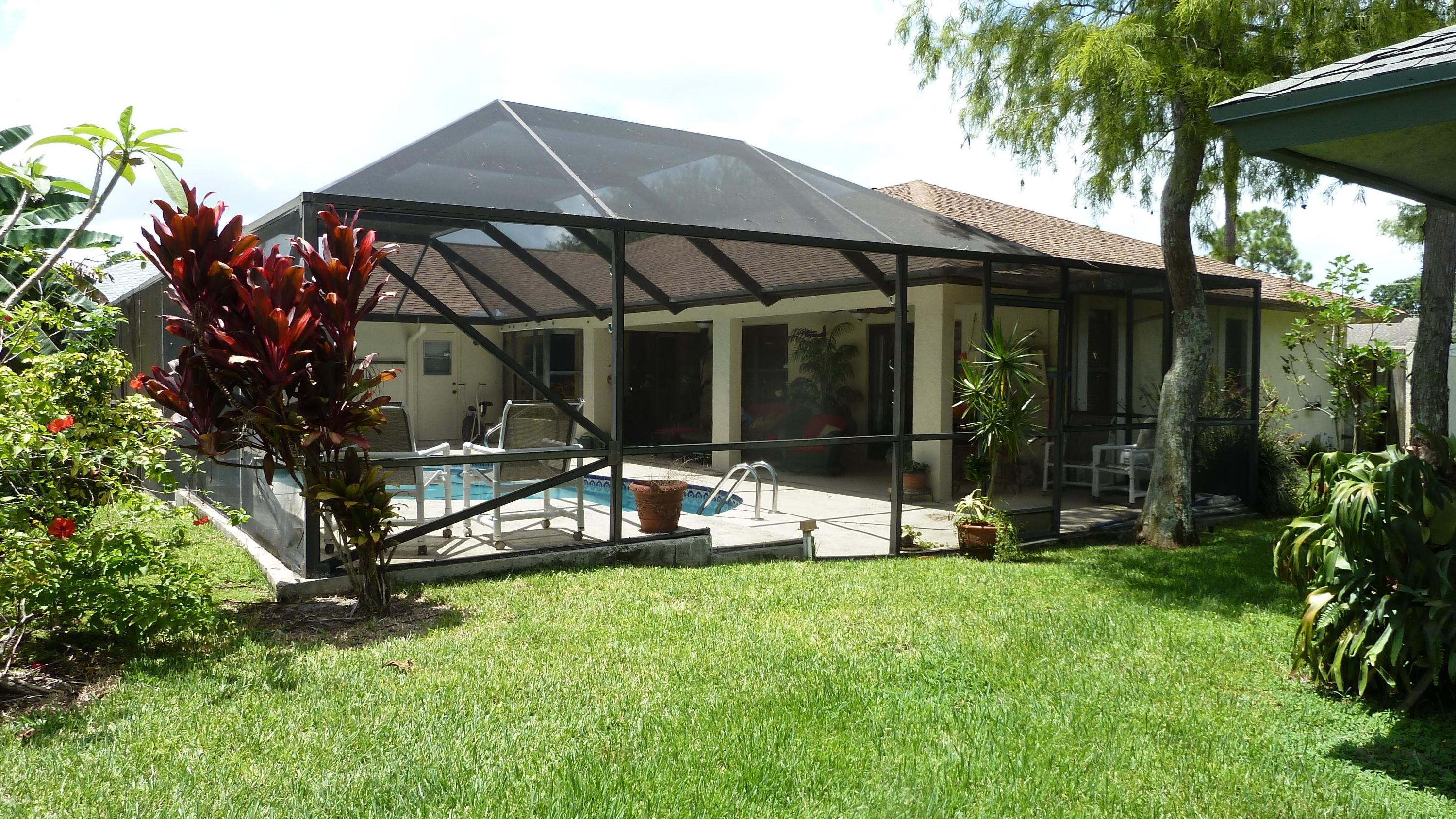 1075 Raintree Lane Wellington, FL 33414 - Photo 21 of 21 Screened enclosure