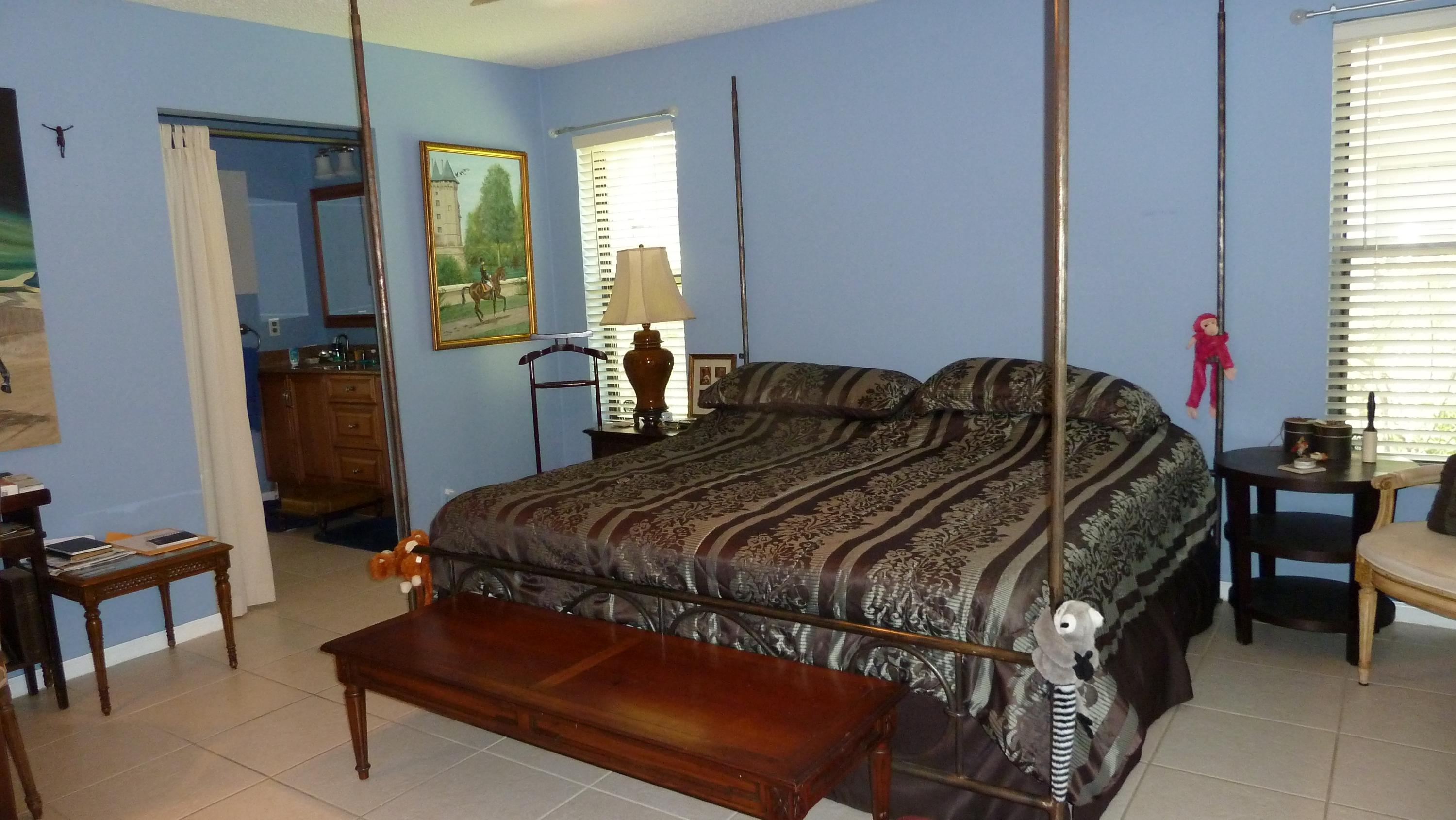 1075 Raintree Lane Wellington, FL 33414 - Photo 10 of 21 Master Bedroom