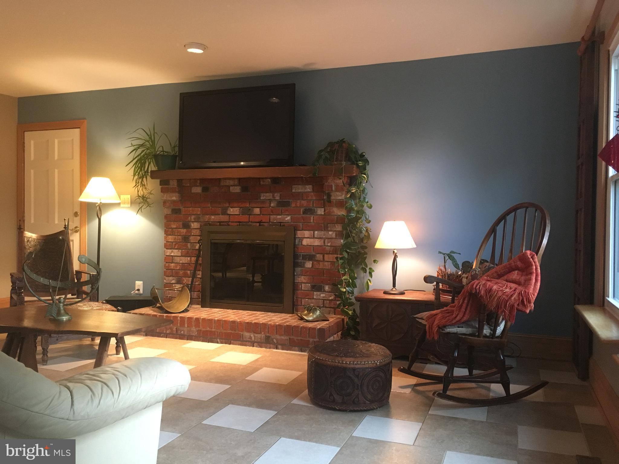 5201 Lynngate Road Columbia, MD 21044 - Photo 9 of 29 Brick Hearth and Wood Burning Fireplace