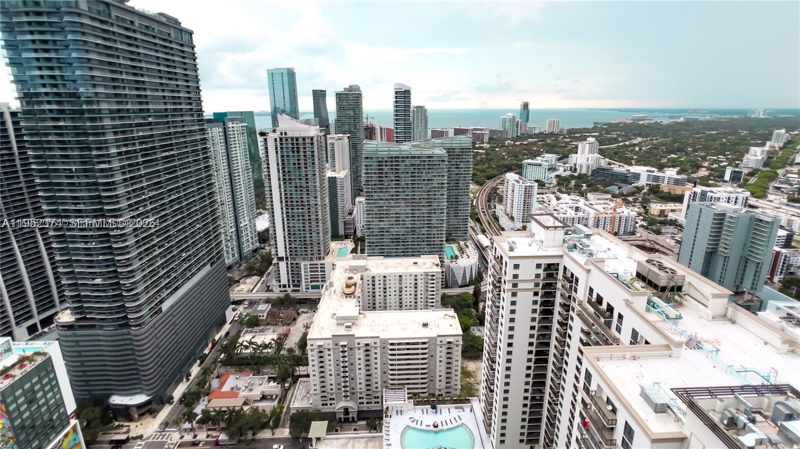 55 Southwest 9th Street, Unit 2305 Miami, FL 33130 - Photo 22 of 23 a view of city with tall buildings