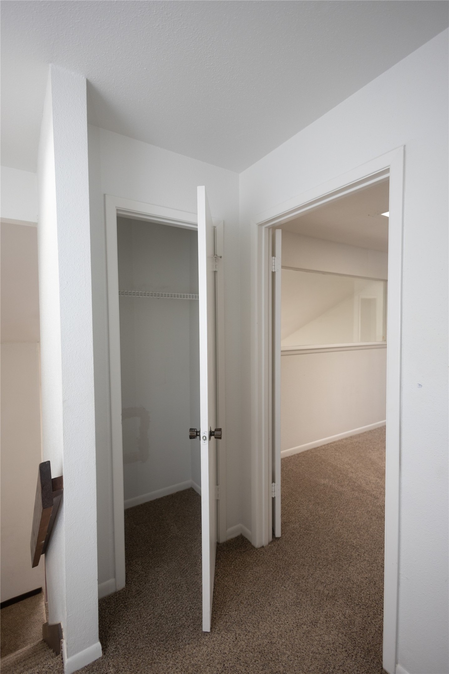 8100 Cambridge Street, Unit 89 Houston, TX 77054 - Photo 25 of 41 View of the storage closet located in the upstairs hallway outside of the primary bedroom.