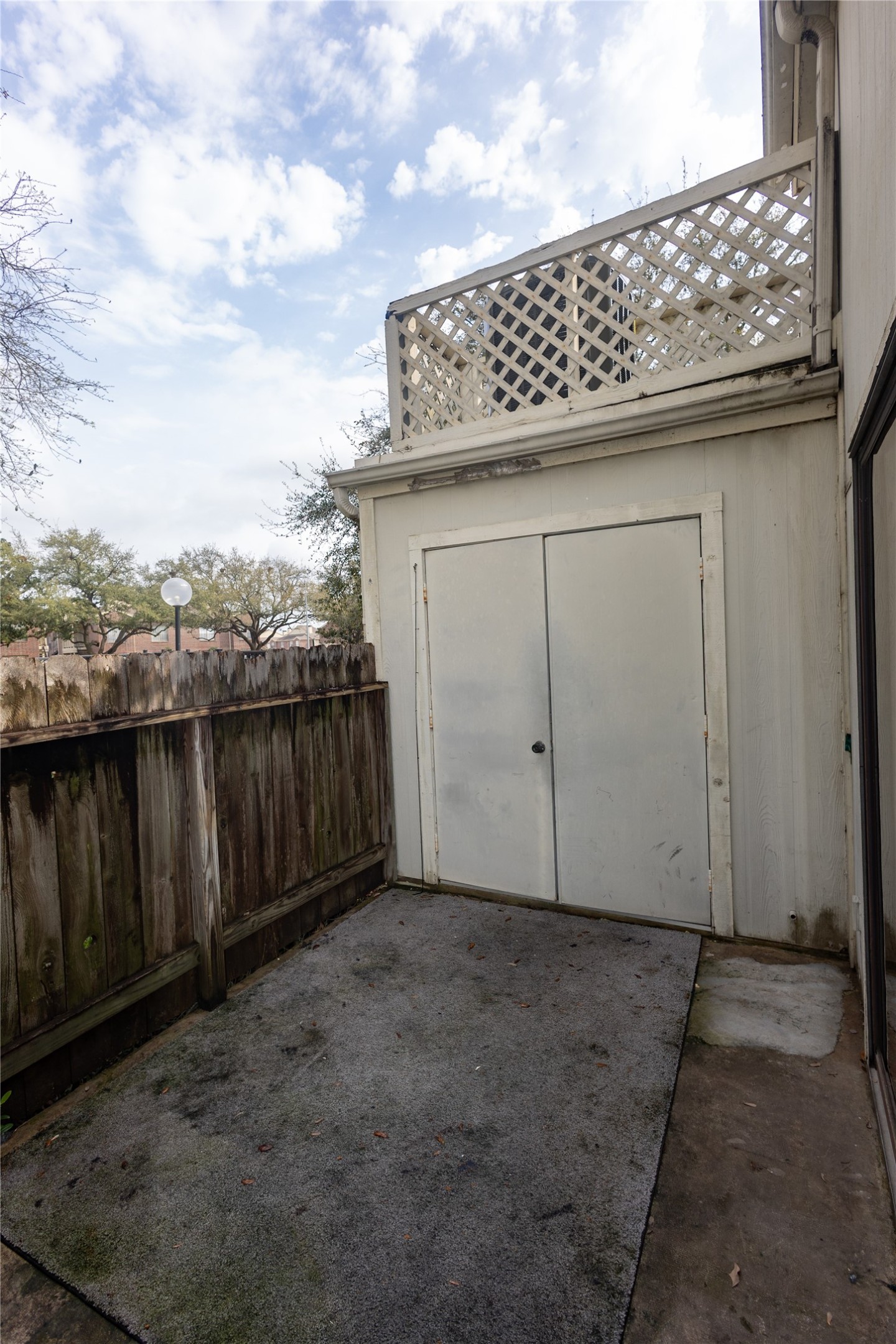 8100 Cambridge Street, Unit 89 Houston, TX 77054 - Photo 39 of 41 Private patio area that can be accessed from sliding door in the secondary bedroom or the living area.