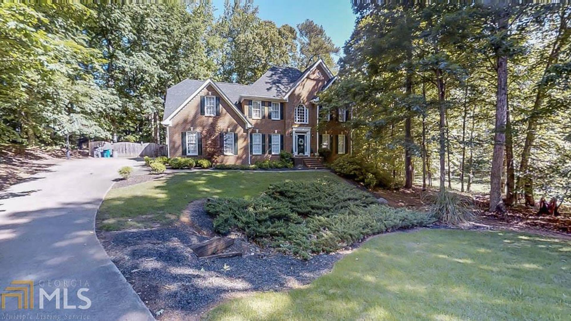 175 Rebel Rise Fayetteville, GA 30215 - Photo 1 of 1 a front view of a house with a yard