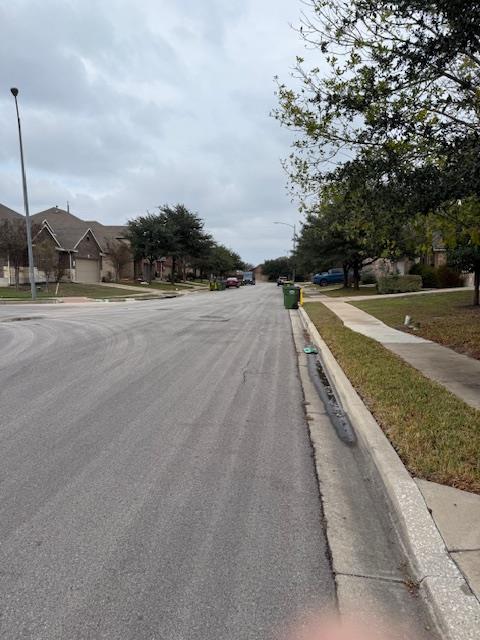 11633 Sun Glass Drive Manor, TX 78653 - Photo 2 of 3 a view of a terrace with a yard