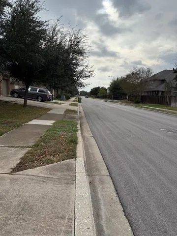 a view of road with trees