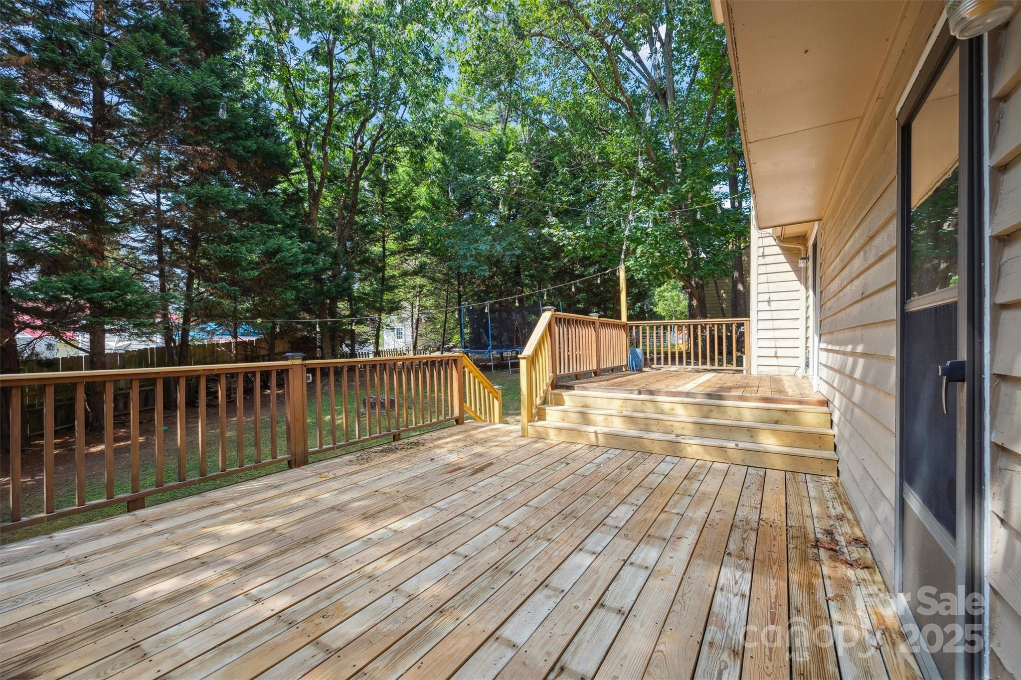 9111 Windjammer Drive Tega Cay, SC 29708 - Photo 23 of 36 a view of balcony with deck and wooden floor