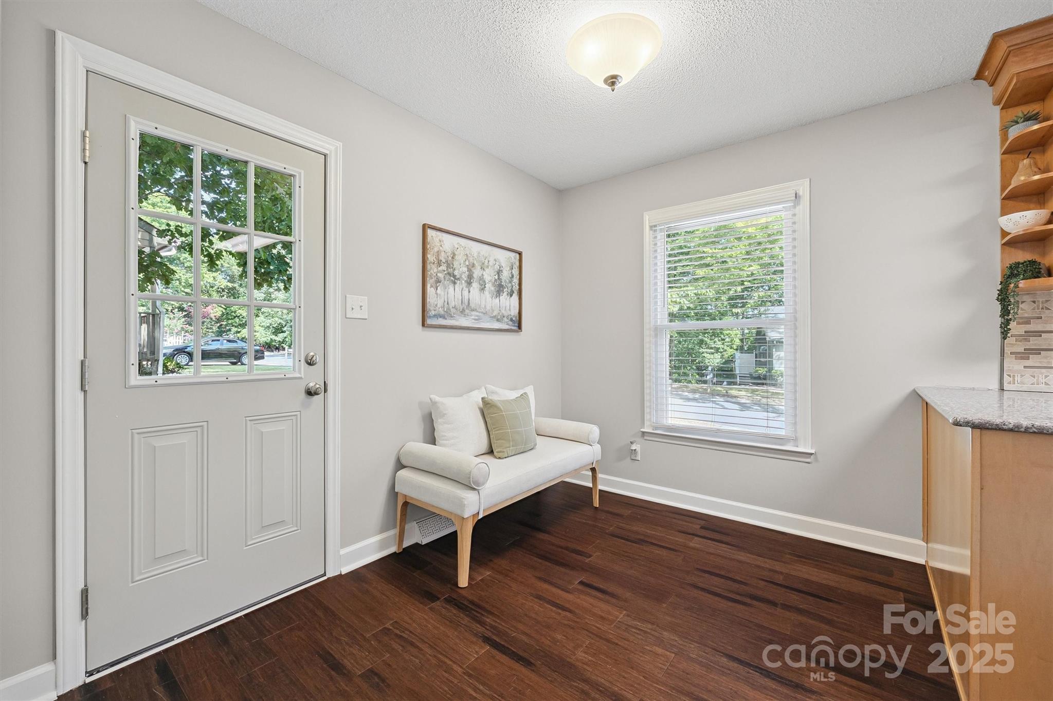 9111 Windjammer Drive Tega Cay, SC 29708 - Photo 7 of 36 a living room with furniture and a window