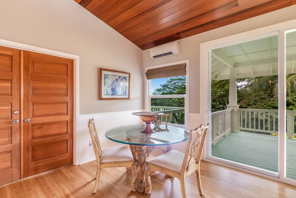 4321 Kapuna Road, Unit D Kilauea, HI 96754 - Photo 6 of 23 a dining room with furniture window and wooden floor