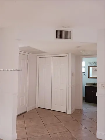 a view of a livingroom with entryway