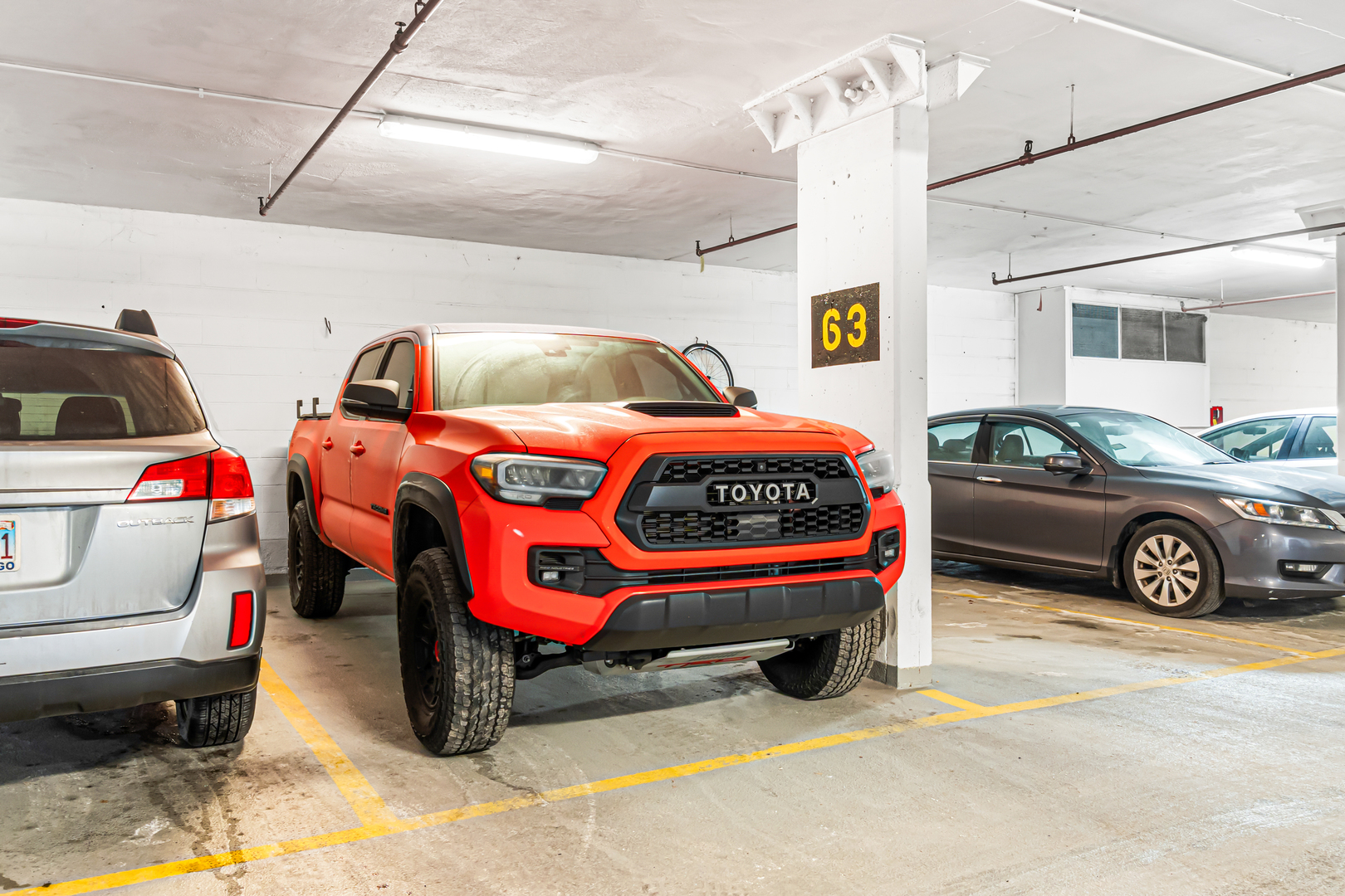 1221 North Dearborn Street, Unit PH8S Chicago, IL 60610 - Photo 24 of 24 a car parked in a garage